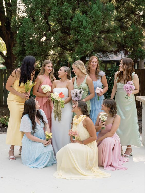 mix and match pastel maxi bridesmaid dresses in yellow, pink, blue and green are amazing to add color