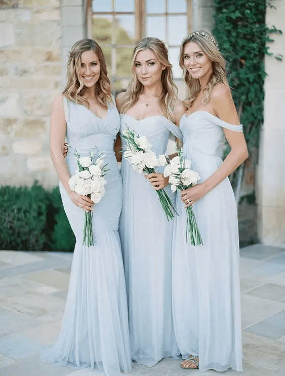 off the shoulder pale blue gowns and a V-neckline mermaid one for the maid of honor are perfect for spring or summer