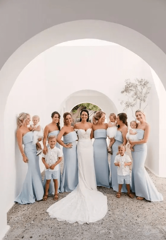 pale blue mermaid strapless bridesmaid dresses are a gerat idea for a beach or ocean wedding