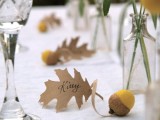 a felt acorn and a leaf place card is a cool idea for a fall wedding, it’s a very easy DIY to make