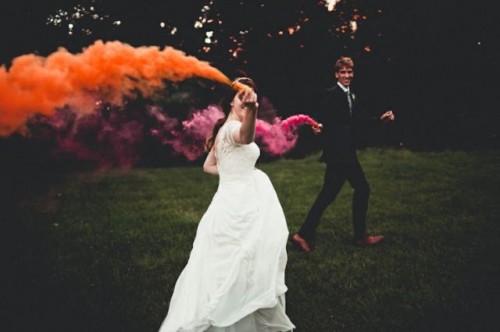 accent your couple walking with bright smoke bombs - this is a very bold and catchy idea