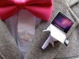 a mini laptop and phone wedding boutonniere is a unique and whimsy piece to accent your look