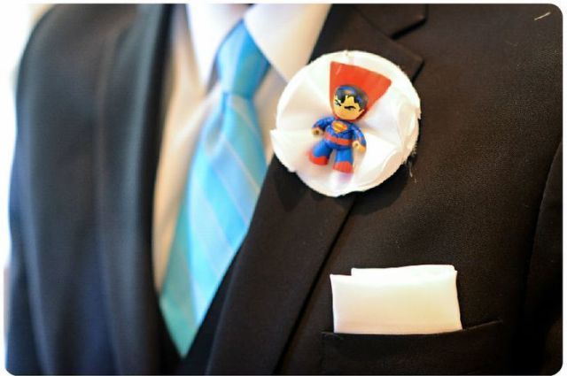 a ruffle Superman boutonniere is a lovely way to accent your look, great for superhero fans