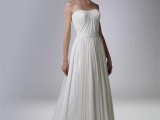 a strapless full pleated wedding dress with a train and a sash is a beautiful idea for a vintage-inspired bridal look