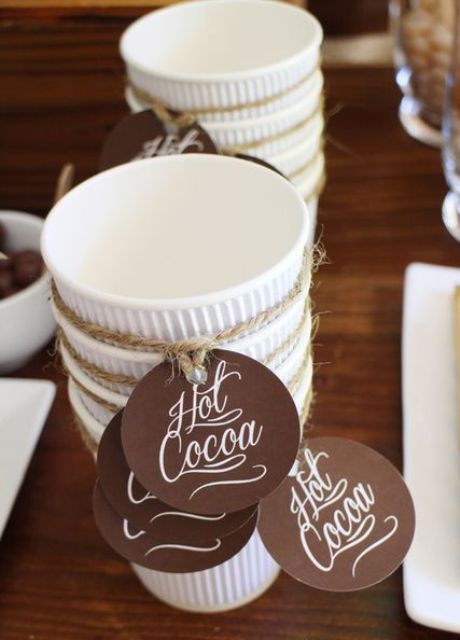 simple paper cups can be spruced up with pretty tags and twine are amazing for your hot cocoa bar
