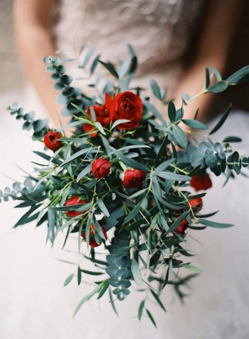 a catchy textural wedding bouquet with greenery, eucalyptus and burgundy ranunculus and peonies is great for a fall wedding