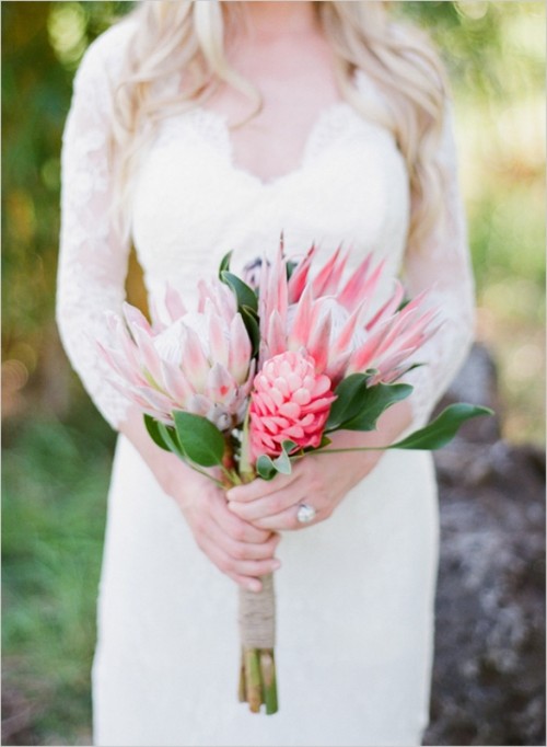 king proteas and leaves are a lovely combo for a spring or summer wedding, these blooms are very textural