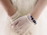net lace gloves and a purple rhinestone bracelet will accent your vintage outfit adding a bit of color to it