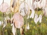 dream catchers with crochet lace and feathers for a wedding backdrop or a beautiful wedding altar