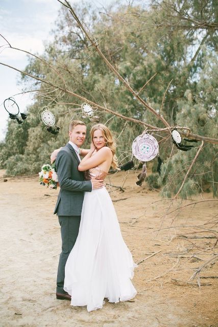 A tree with some dream catchers hanging is a nice idea for wedding decor or even for a wedding altar