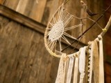 a simple dream catcher with crochet lace, long fabric fringe is a cute idea to decorate a space