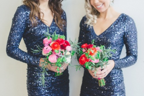 navy sequin bridesmaid dresses with V-necklines and long sleeves are a stylish and bright option for a fall or winter wedding