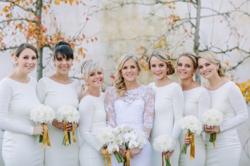 white bridesmaid dresses with bateau necklines and long sleeves are a very elegant solution, they can be rocked at any wedding to pull off the all-white bridal party trend