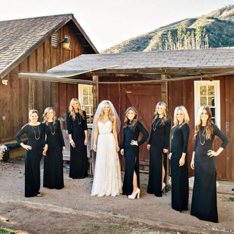 black maxi bridesmaid dresses with high neckline and long sleeves paired with long necklaces are amazing for a fall or winter wedding