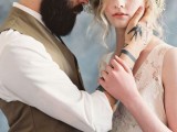 an elegantly cuffed white shirt shows off the groom’s hand and arm tattoos at their best