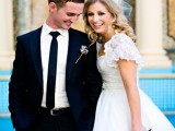 a black and white lollipop wedding bouquet plus a matching boutonniere are fun and cool accessories for a wedding