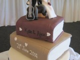 a cool books and guitar wedding cake