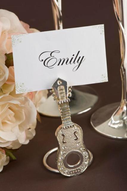 an embellished guitar card stand is a lovely and chic idea for a wedding tablescape