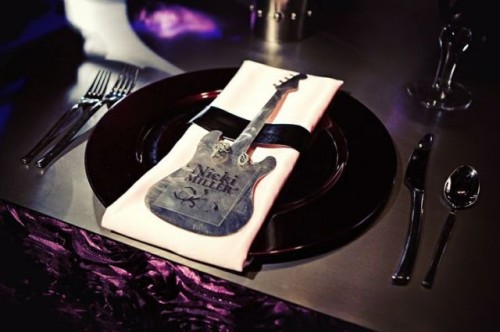 a guitar-shaped card with an acrylic tag is a fun and cool idea for a rock-n-roll wedding