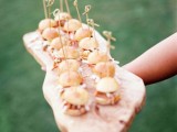 serve mini burgers on a rough wood slice tomake them look more special, such a tray is great