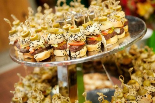 a whole stand with very mini burgers of various delicious stuff is a cool idea for a modern wedding