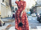 a red floral midi dress with an A-line silhouette, black shoes and a black bag is a trendy idea – florals are a hot idea