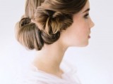 a twisted low updo inspired by Princess Lea’s hairstyles is a lovely and cool idea to rock