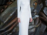 an ultra-minimalist plain sheath wedding dress with a high neckline and long sleeves inspired by Lea’s looks