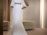 a Grecian-style wedding dress with embellished shoulders and a sash and a train is inspired by some looks from Star Wars