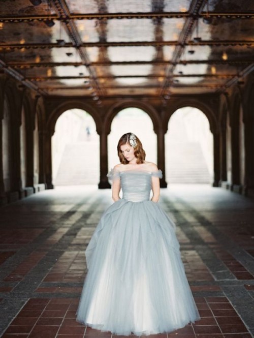 a dove grey off the shoulder wedding ballgown with a layered bodice and skirt is a glam and romantic option