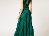 an emerald high neckline A-line wedding dress with a keyhole back and a tiered skirt for a boho bride