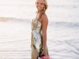 a fabulous gold sequin strapless wedding dress with a draped bodice and a pleated skirt for a beach or coastal bride