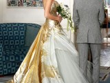 a jaw-dropping white and gold strapless wedding ballgown with a long gold train of miss Serena van der Woodsen