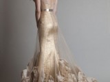 a glam gold sheath wedding dress with a sheer coverup with floral appliques that form the train of the dress