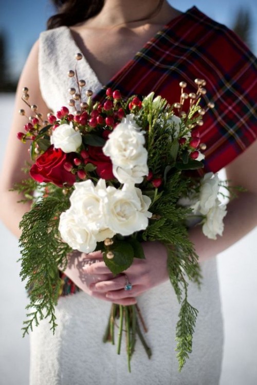 a tartan coverup for a winter or Christmas wedding is a stylish idea for a bride who wants to embrace the season