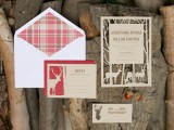 a red and white wedding invitation suite with laser cut parts is a stylish idea to go for