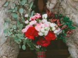 a bold winter wedding bouquet with a tartan wrap is a stylish and cool idea for a winter wedding