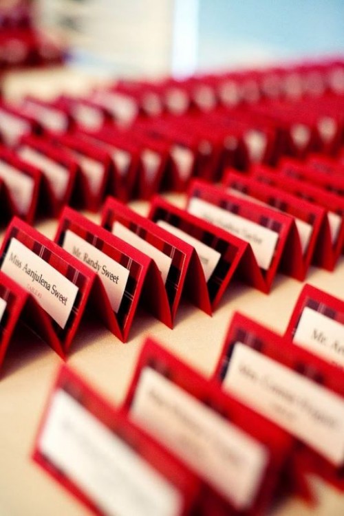 red tartan card holders is a stylish idea for a winter or Christmas wedding
