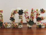 LOVE letters made of faux blooms and succulents that won’t wither even if the weather is hot