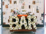 BAR letters done with white blooms are amazing for decorating your wedding venue