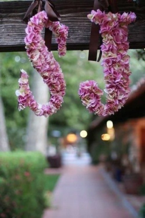 monograms done with pink blooms are very cute and very romantic decorations