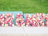 Mr and MRs letters done with pink and white blooms are very bold and cool ones