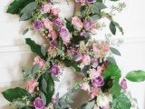 a monogram fully made of greenery and blooms is a chic wedding decoration that is non-typical