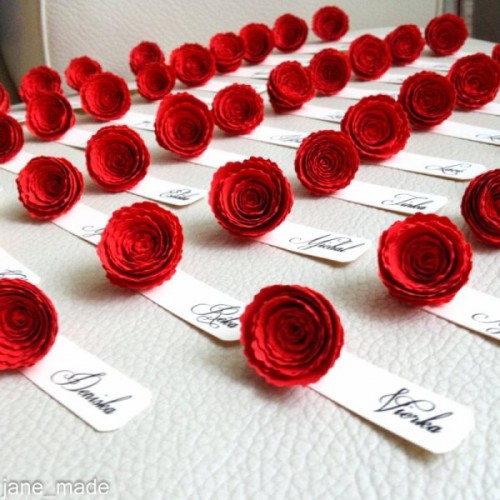 fabric red roses with cards are a great idea for a Valentine's Day wedding, they will easily fit any style