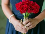 a classic red rose wedding bouquet is a nice idea for both a bride or a bridesmaid, it can be carried for any type of a Valentine’s Day wedding