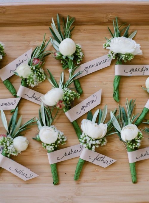 cute boutonnieres of greenery and white blooms are great for grooms and groomsmen