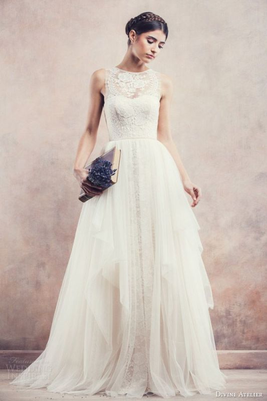 a chic and stylish sleeveless A line wedding dress of lace, with a high neckline and a layered skirt with a train is a lovely idea