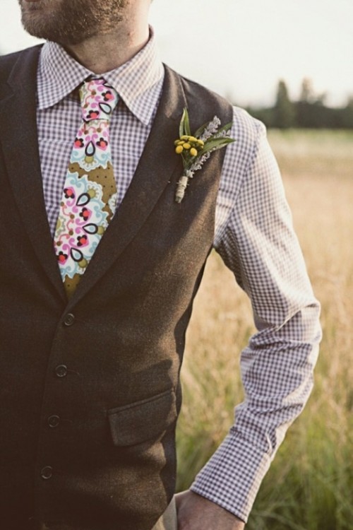 a chic look with a lilac checked shirt, a bold printed tie and a brown waistcoat is amazing