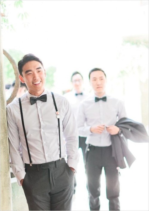 a neutral and chic look with grey pants, a white shirt, black suspenders and a bow tie is a comfortable and timeless idea