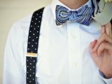 a white shirt, a printed blue bow tie, printed suspenders for a fresh and bold spring groom’s look